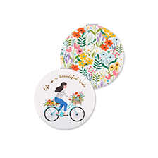 Taschenspiegel mit Blumen und Fahrradfahrerin
